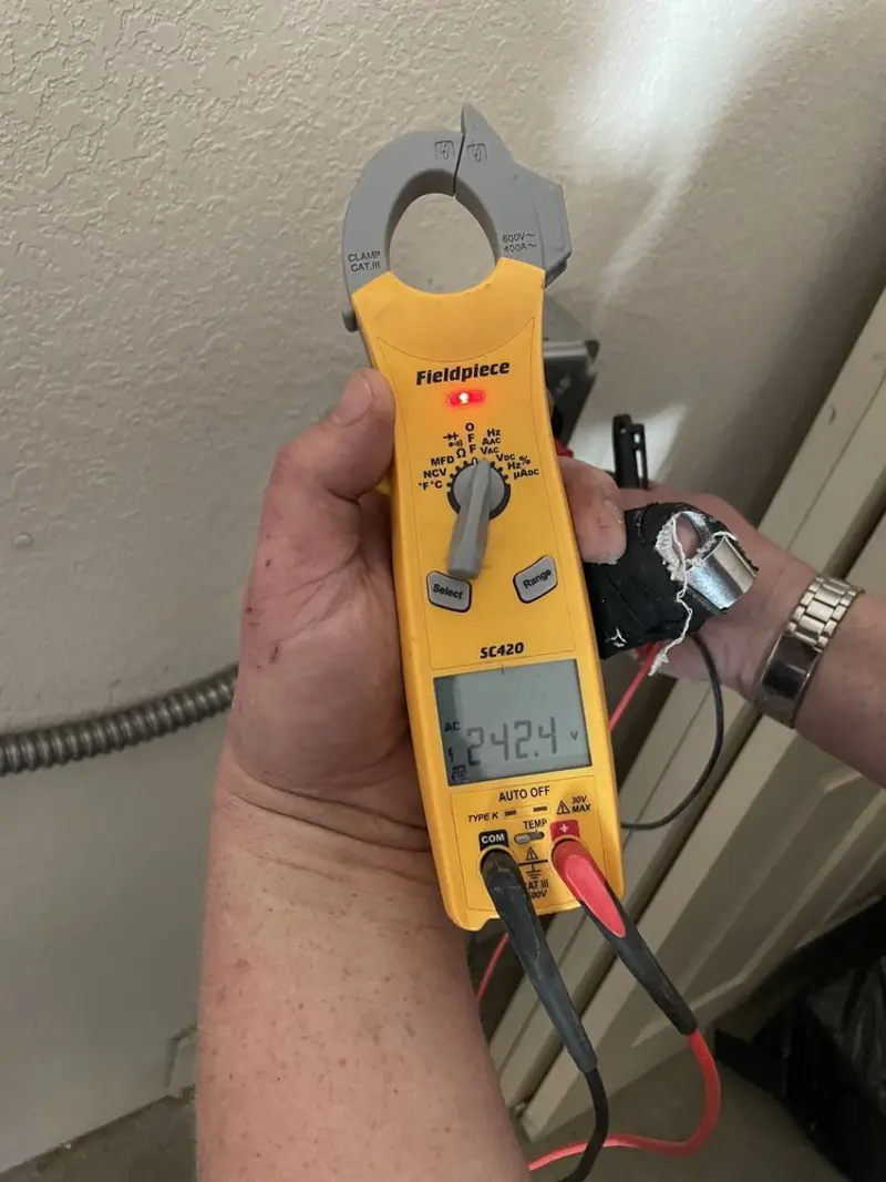Voltage testing with clamp meter during Electrical Installation Services in Rio Vista